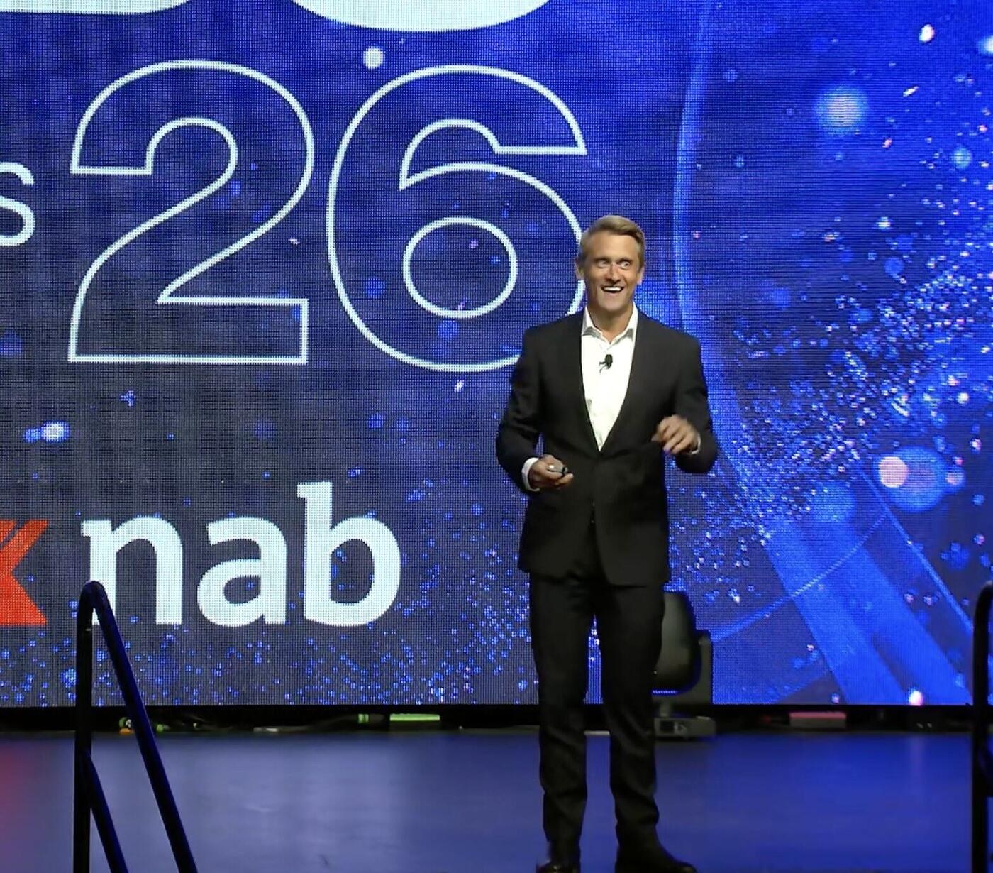 Adam Franklin delivering an AI keynote on the main stage at the Better Business Summit